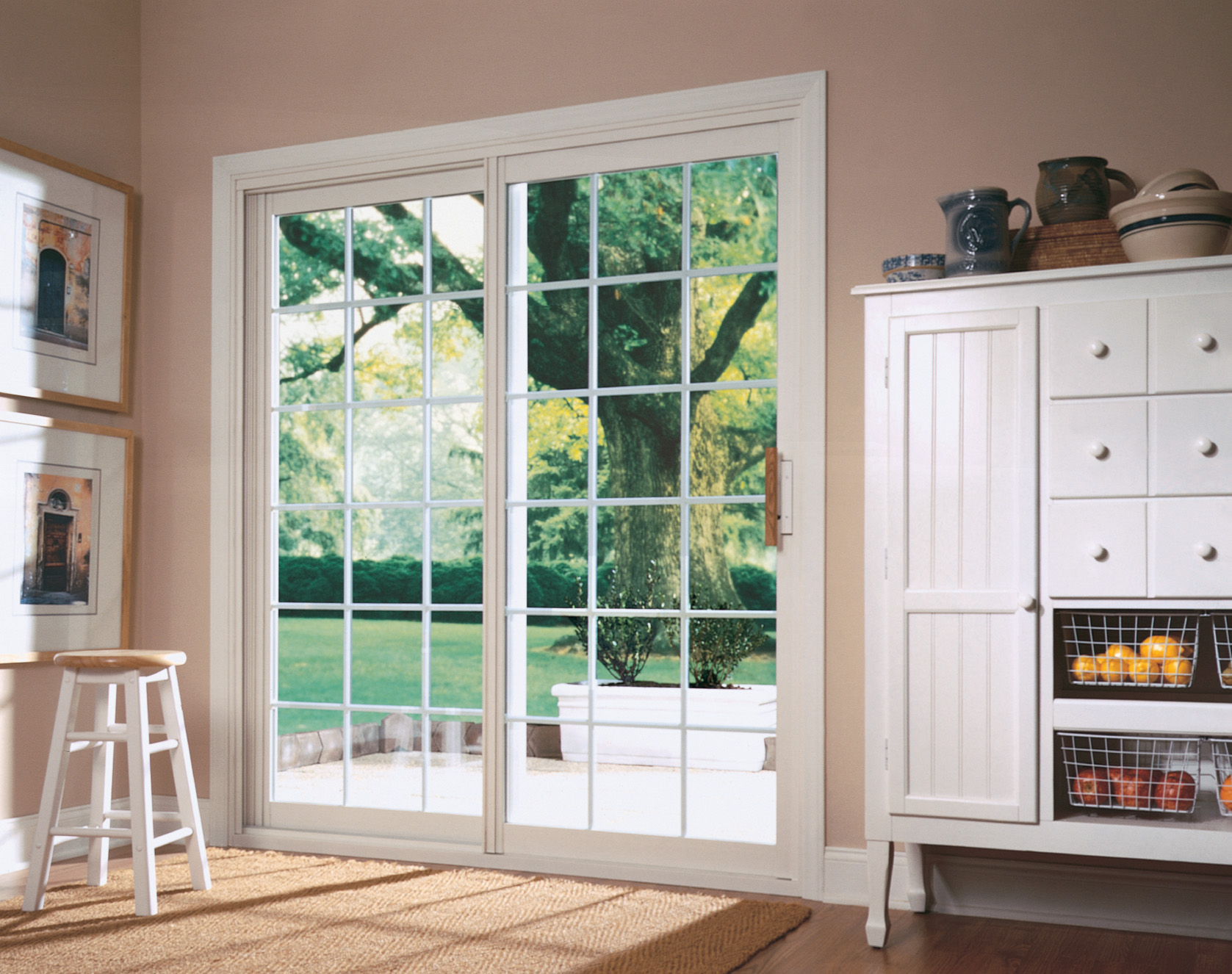 Warm light enters the room through a classic French door